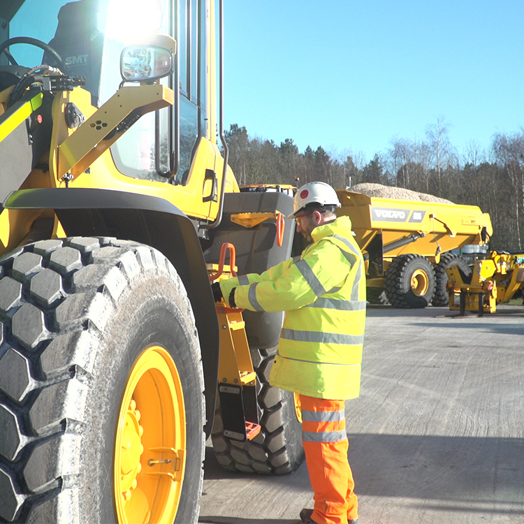 Man with plant machinery