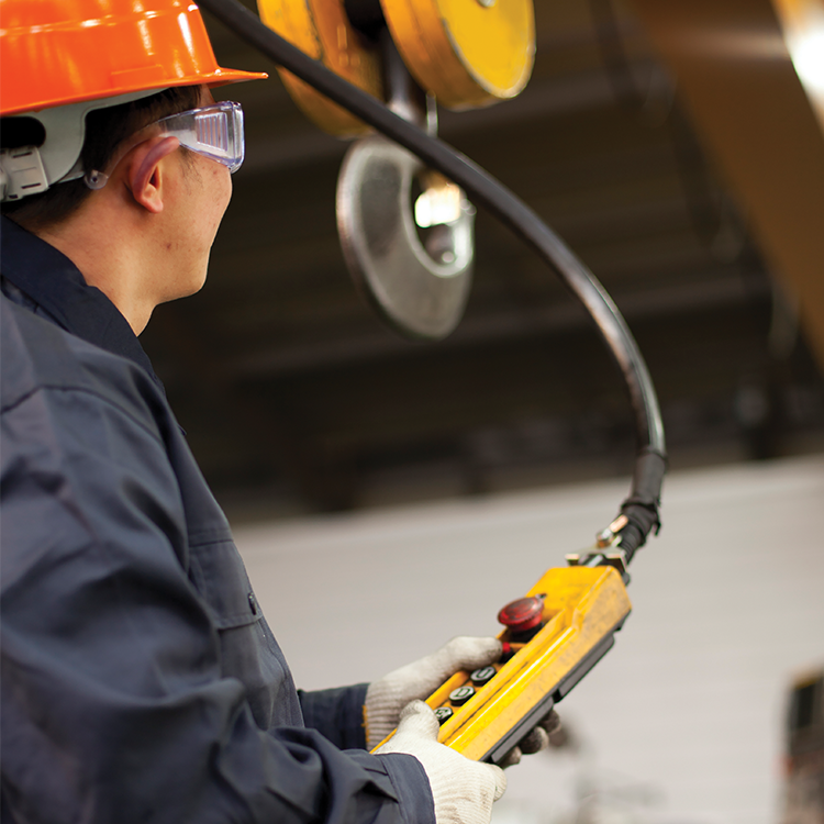 Man with Overhead Gantry Crane