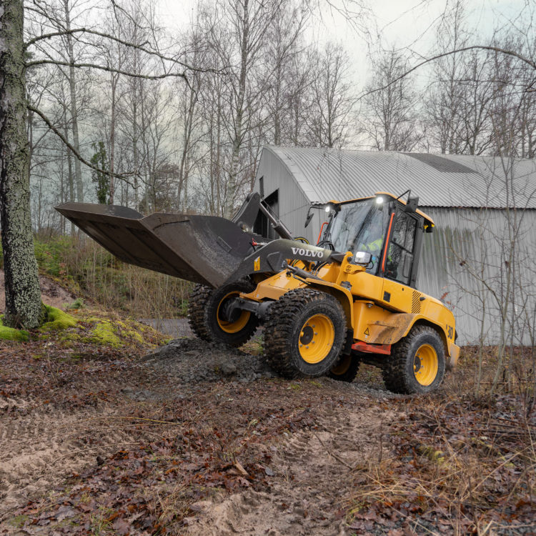 Compact Wheel Loader Operating on Rough Terrain