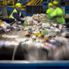 Men Working on Waste Line