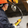 Man with Overhead Gantry Crane